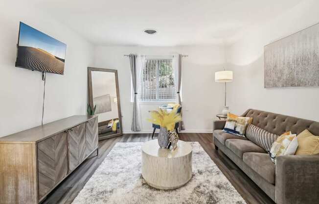 a living room with a couch and a coffee table