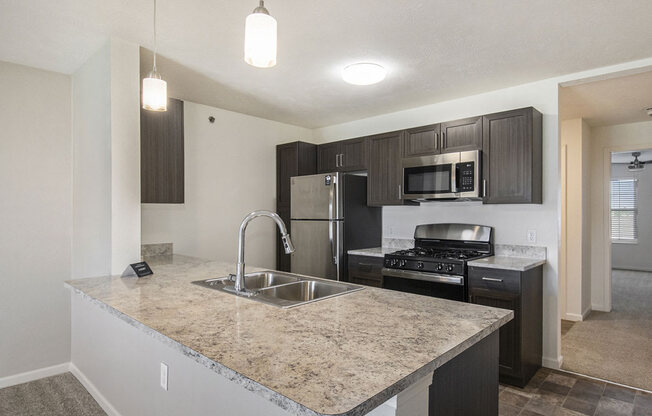 Two bedroom kitchen layout at Andover Pointe Apartment Homes, NE, 68138