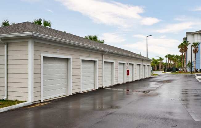 a row of garage doors on the side of a building