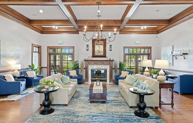 a living room filled with furniture and a fireplace