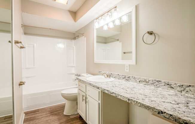 bathroom with granite countertops at The Life at Edgewater Landing, Columbus, Ohio