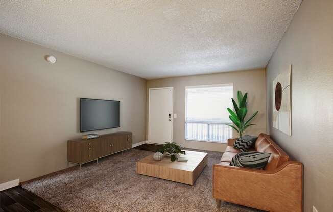 One Bedroom 625sqft living room at River Oaks Apartments in Tucson