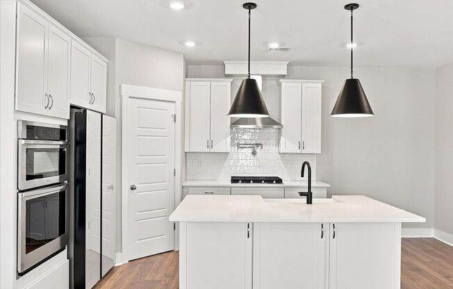 Beautiful 4 Bedroom, 3.5 bath townhome plus additional office/flex space!