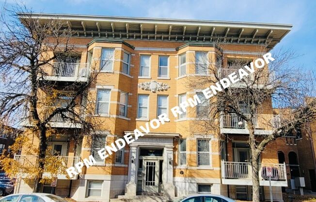 "Charming 2-Bed Condo with Bay Window & Gated Parking Near Wash U!