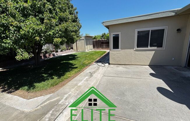 **Spacious 5-Bedroom Home with Modern Upgrades and Private Backyard Available Now**