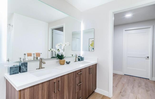 Indulge in luxury at Modera Pomona with our designer bathrooms featuring double vanities and sleek quartz finishes.