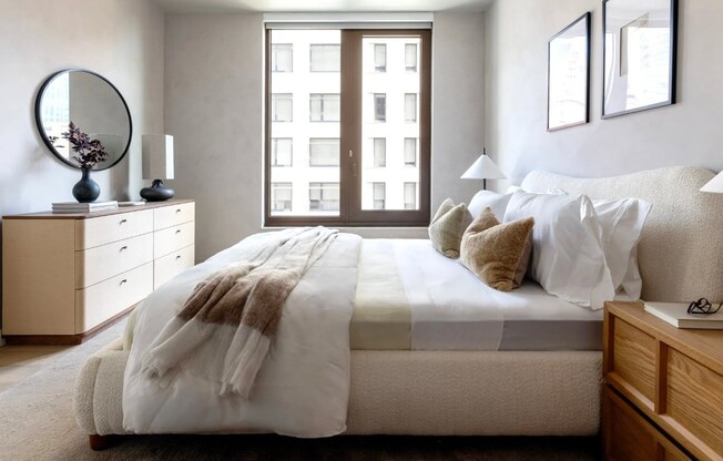 Welcome to Anagram Turtle Bay, where modern elegance meets urban living. This stylish bedroom features luxurious linens and ample natural light, creating a serene retreat right in the heart of the city. Schedule your tour today!