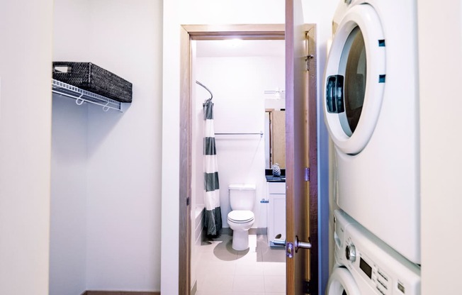 7West Apartment Homes Bathroom with In-Unit Washer and Dryer