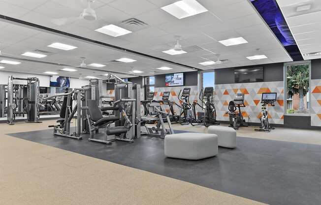 a gym with cardio machines and other exercise equipment in a building Doncaster Village, Parkville MD