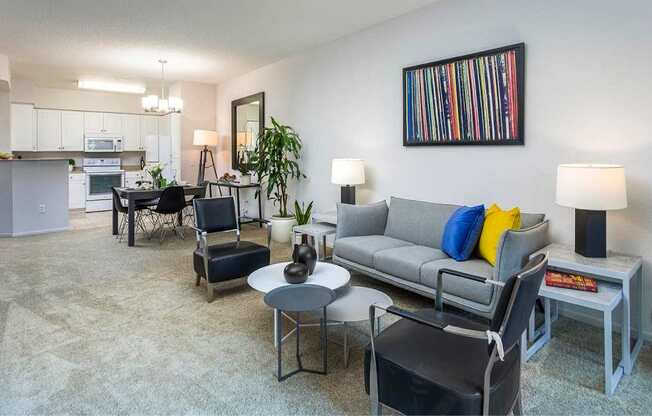 Living Room With Kitchen View at Towers at Costa Verde Apartments, San Diego, 92122