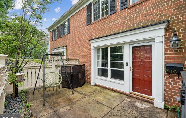 Welcome to this beautifully updated three bedroom, two and a half bath brick townhome in the sought after Parkside at Alexandria.