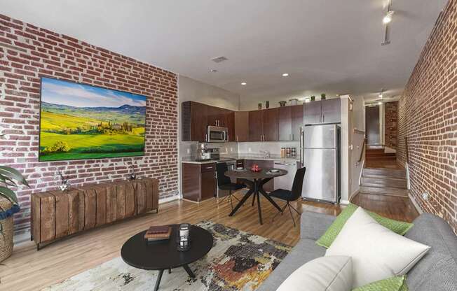 a living room with a couch and a table