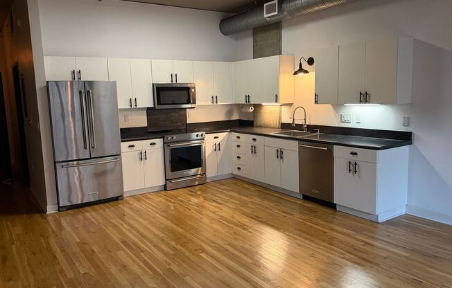 McKenzie Lofts - 2nd floor west facing Pearl District studio w/parking/storage/covered balcony