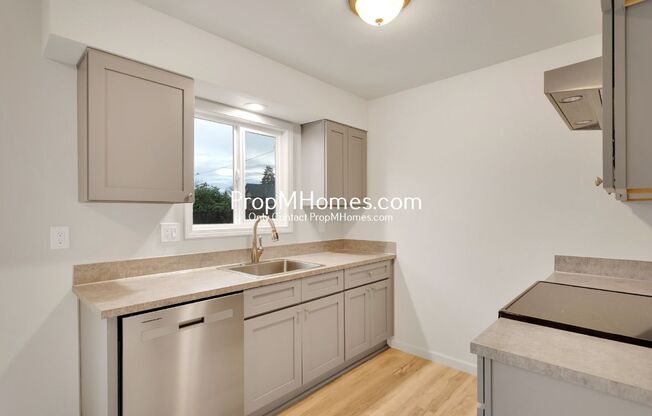 Move-In Ready 2-Bedroom with Parking, Modern Kitchen, & Outdoor Charm!