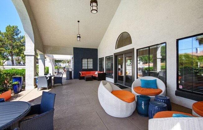Covered outdoor poolside lounge area
