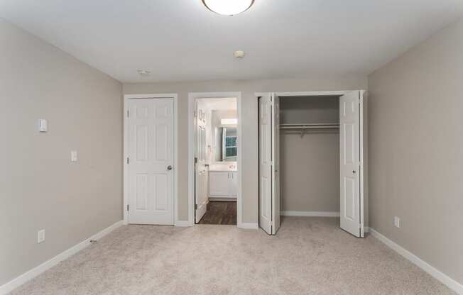 Novela Apartments Bedroom with Bathroom Door