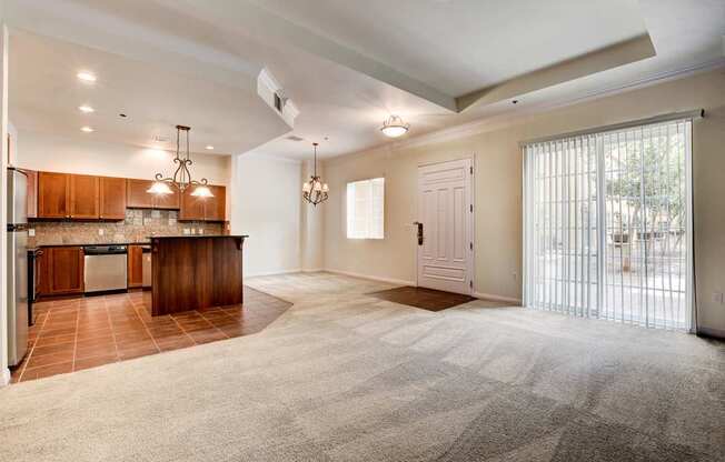 A spacious kitchen with wooden cabinets and a large island.