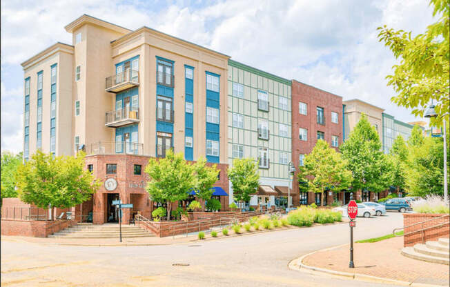 outdoor main road view of building with onsite retail shops