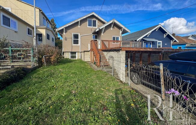 Light-Filled Home with Vaulted Ceilings, Bonus Basement & Walkable Location