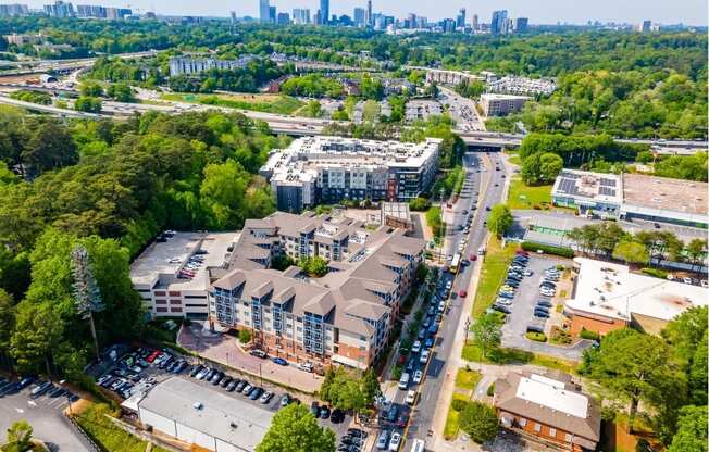 an aerial view of a building in the middle of a city