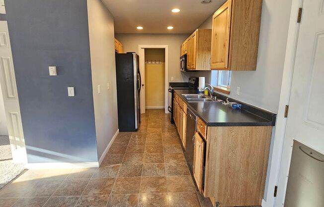 Charming 1-Bedroom Home with Spacious Backyard, 2 car garage & Modern Amenities – Pet Friendly!