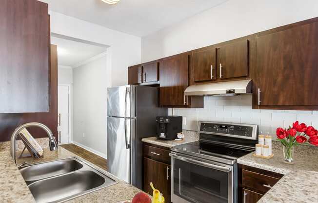 One K Apartments in Atlanta, GA photo of our apartments offer a modern kitchen with stainless steel appliances