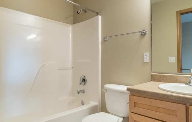 bathroom with shower and tub combo