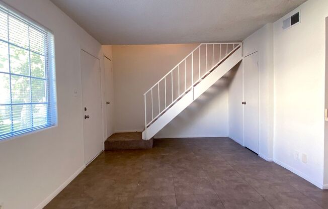 Great 3 bedroom and 1.5 bath townhouse with a small yard and 2 car garage.