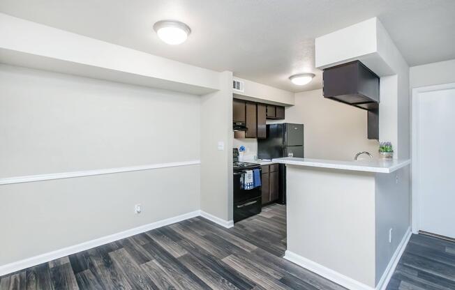 a kitchen with a wood floor