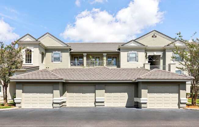 A large, two-story house with a garage.