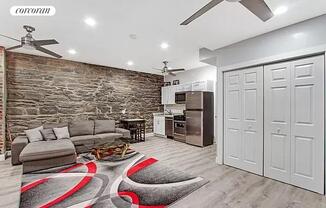 203 E 13 ST