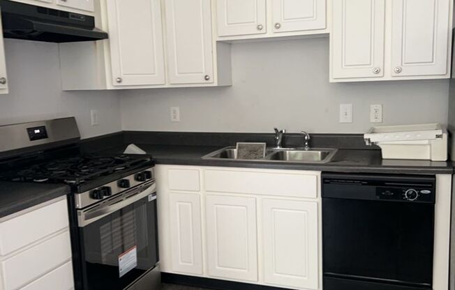 Ready for Now! Located in Raleigh. 3 Story End unit Townhome