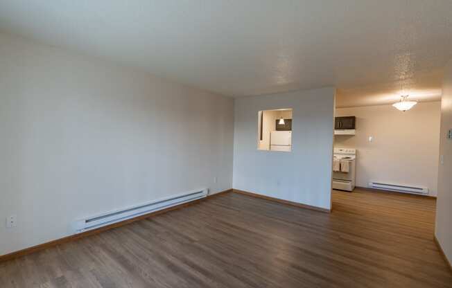 Fargo, ND Parkside Apartments. A living room with a hardwood floor
