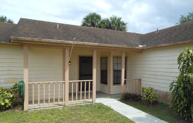 3 BEDROOM, 2 BATH CANAL FRONT HOME CONVENIENTLY LOCATED IN PORT ST LUCIE WITH A FENCED BACKED YARD, TILE & LAMINATE THROUGHOUT!