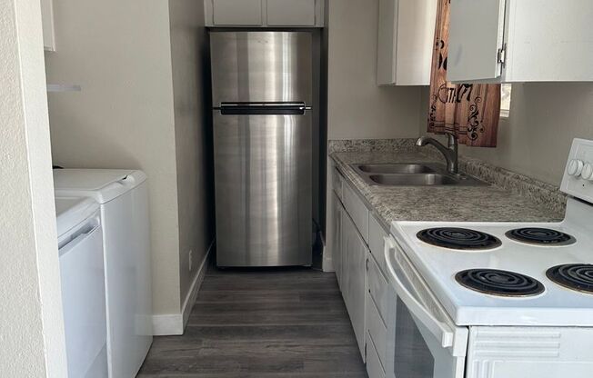 Three bedroom townhome with 2 car garage and courtyard