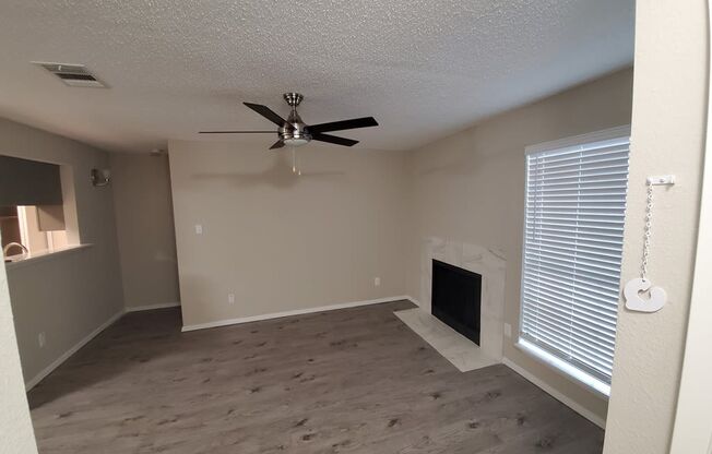 Trails of Walnut Creek living area with fireplace