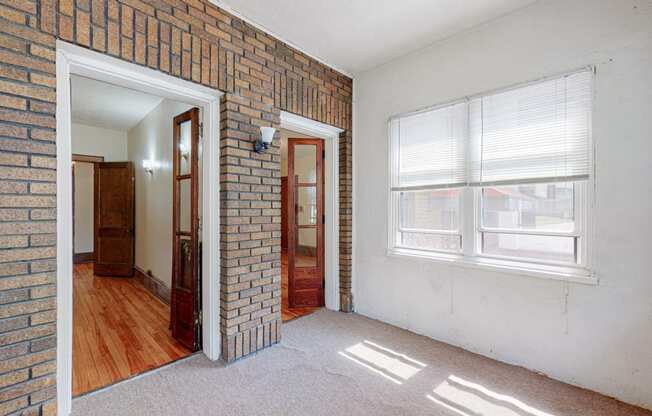 Sibley_3br_porch with exposed brick