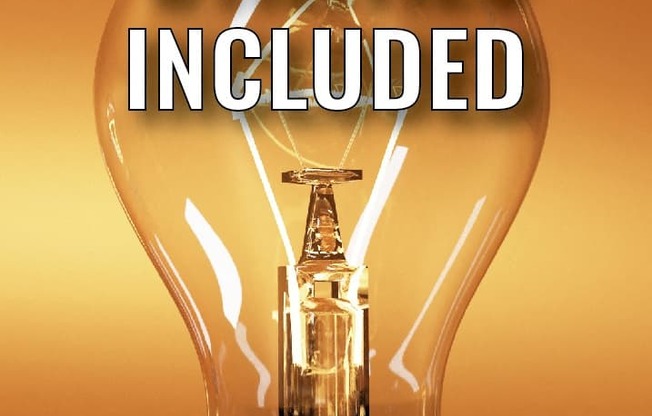 A light bulb with the text "ALL UTILITIES INCLUDED" on it.