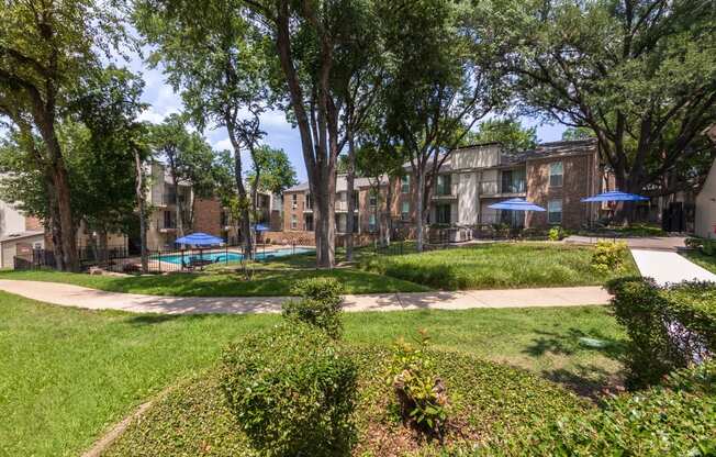 This is a photo of building exteriors/grounds at Canyon Creek Apartments in Dallas, TX.