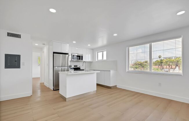 Brand New 2023 Renovated Building! 1 Bd/1 Ba, quartz countertops, washer/dryer, stainless steel appliances, 1 parking space.