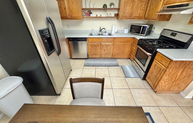 FULLY FURNISHED 2 BEDROOM, 2 BATHROOM FIRST-FLOOR CONDO LOCATED IN THE HEART OF SPRING VALLEY! THIS SPACIOUS UNIT FEATURES A COZY LIVING ROOM WITH FIREPLACE,