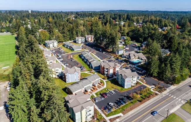 a aerial view of a community with houses and trees at Woodcreek, Washington