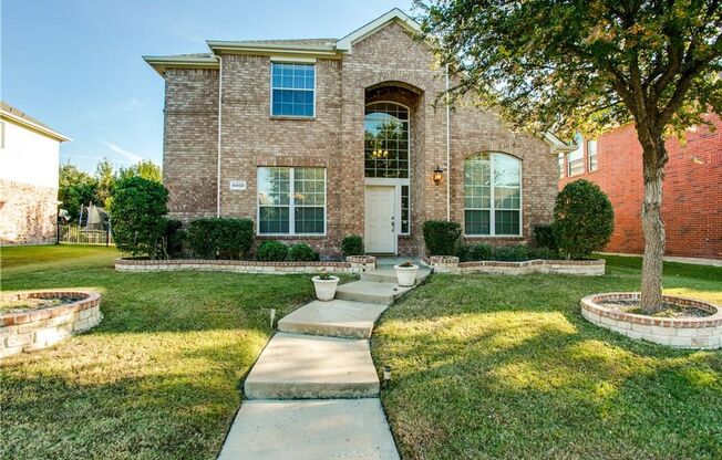 Beautifully landscaped 4 Bedroom 3 bath home located in desirable Plano location!