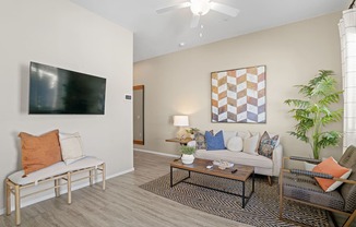 a living room with a couch and a table