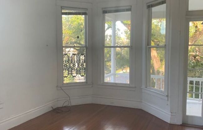 Cute upper apt. with high ceilings and wood floors.