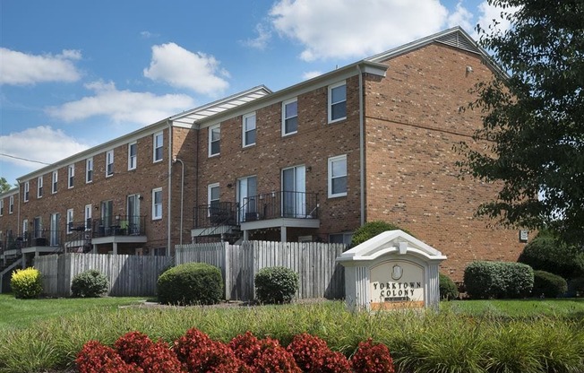Apartment building, grounds, and community signage