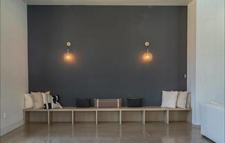 A room with a bench and two lights on the wall at Northplace Apartment Homes, Salem, Oregon