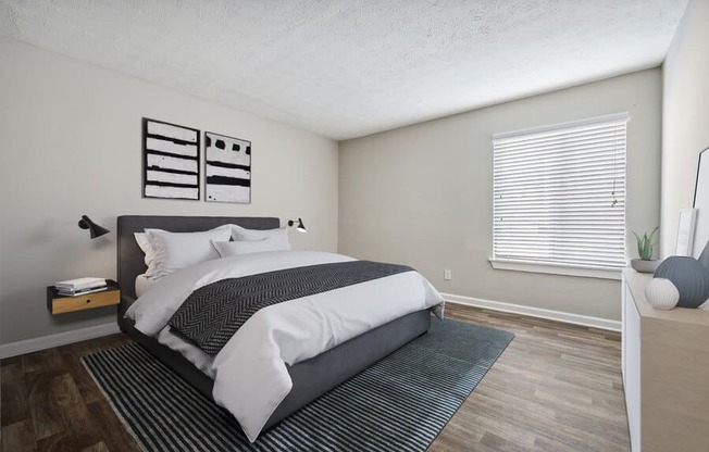 Model bedroom with queen-size mattress