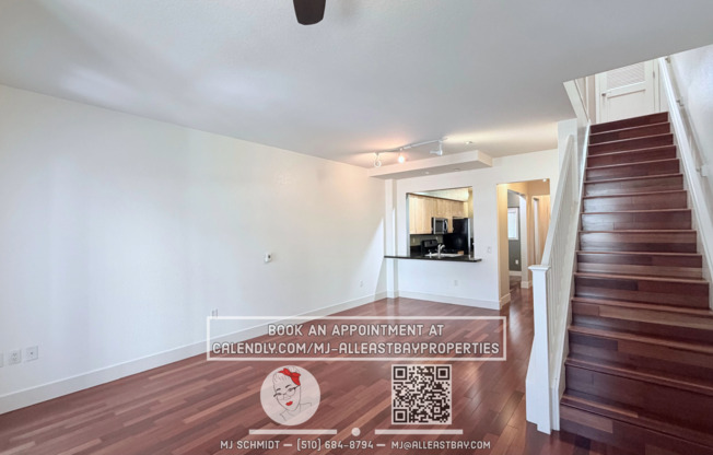 3-bed, 1.5-bath two-story condo, with rich hardwood floors, a modern kitchen, and spacious bedrooms with natural light. located above bustling Bay St. with shopping and restaurants steps away.