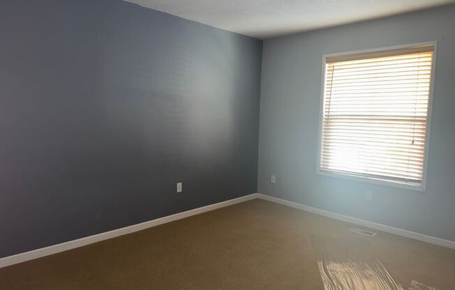 Charming Remodeled Townhome in Raleigh West - Prime Location w/ Garage & Private Patio